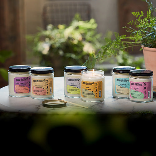 soap distillery soy wax candles in a lifestyle setting. vegan wax, strong through, made in the USA with clean fragrances.